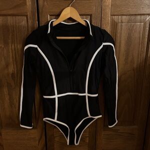 Black and White adult One Piece quarter zip style swim suit